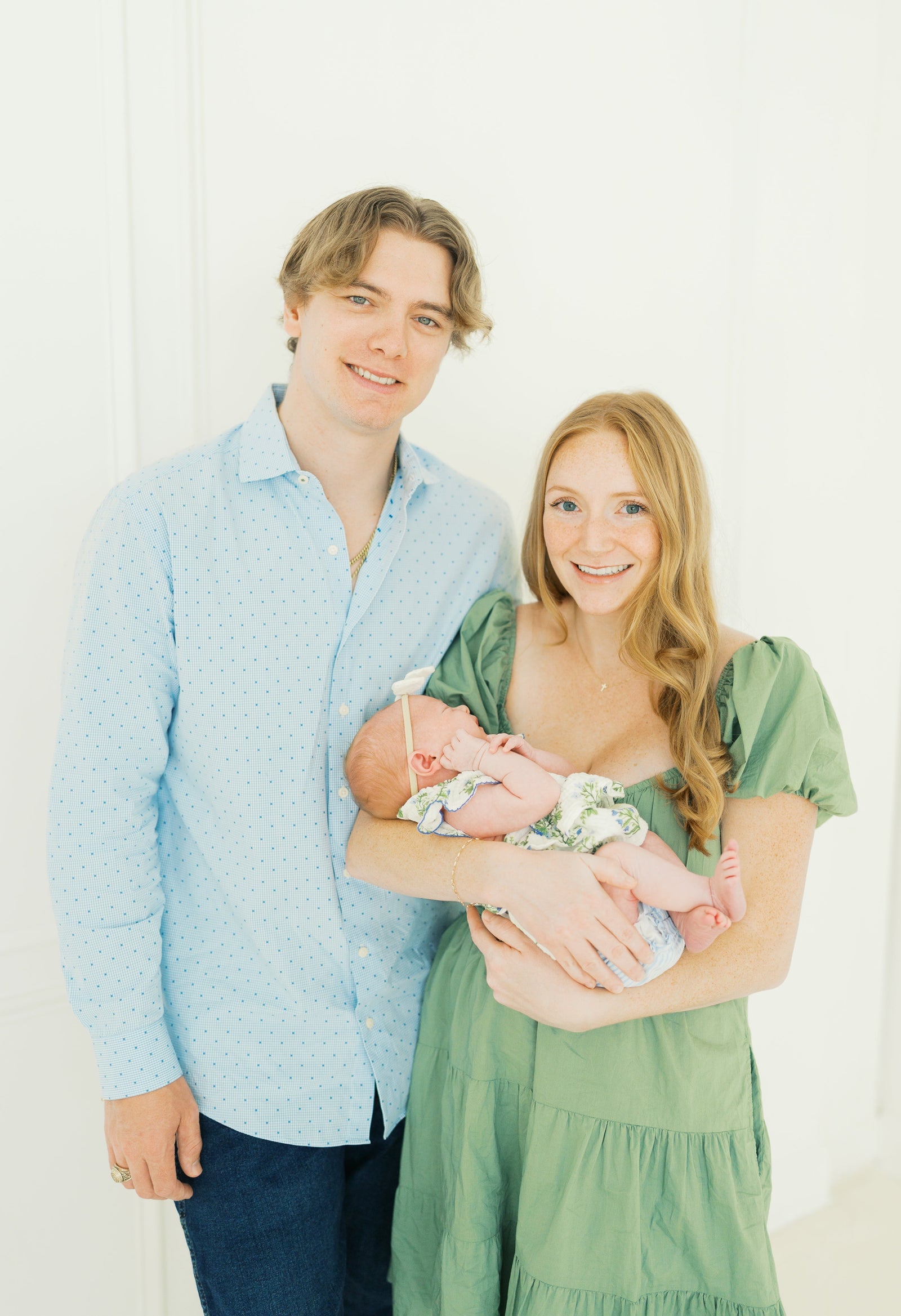 Photo of Madison Mote with her husband Canon and baby girl.